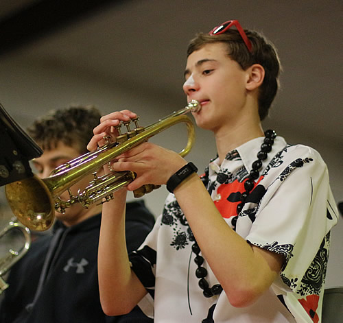Student plays trumpet in the pep band